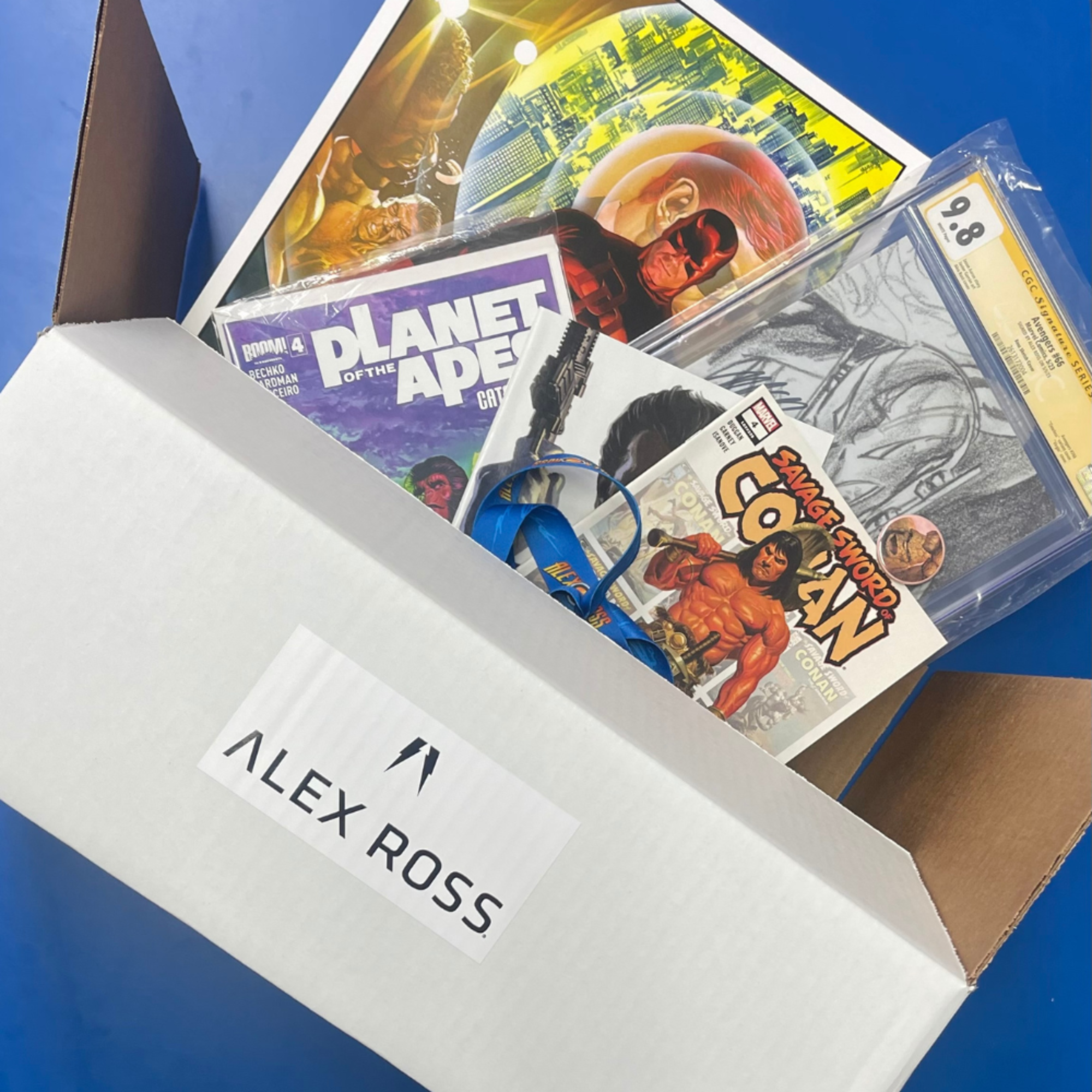 Collector's Club open box featuring Planet of the Apes and Conan comics and art