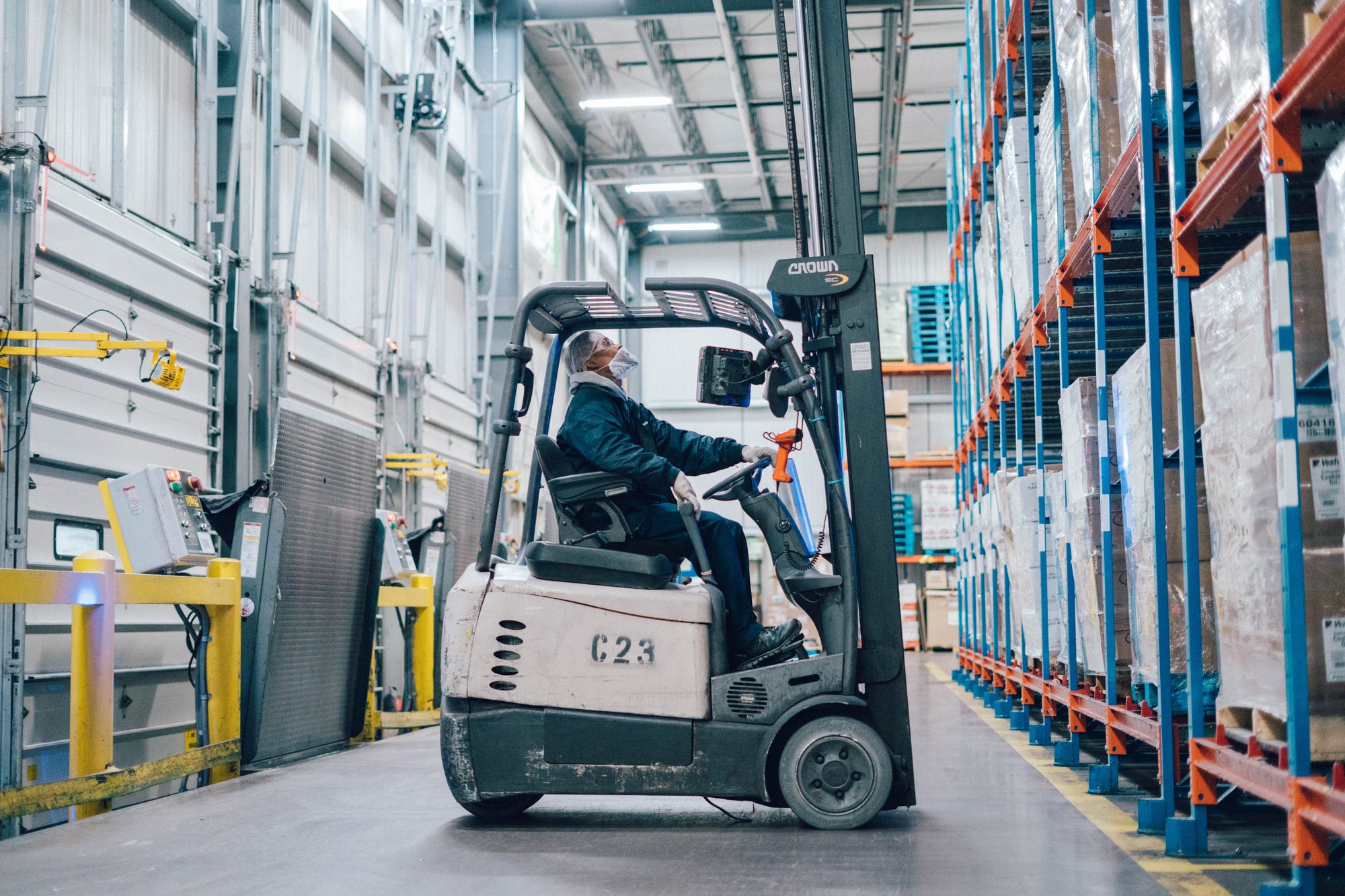 Brand photography — employee at workstation