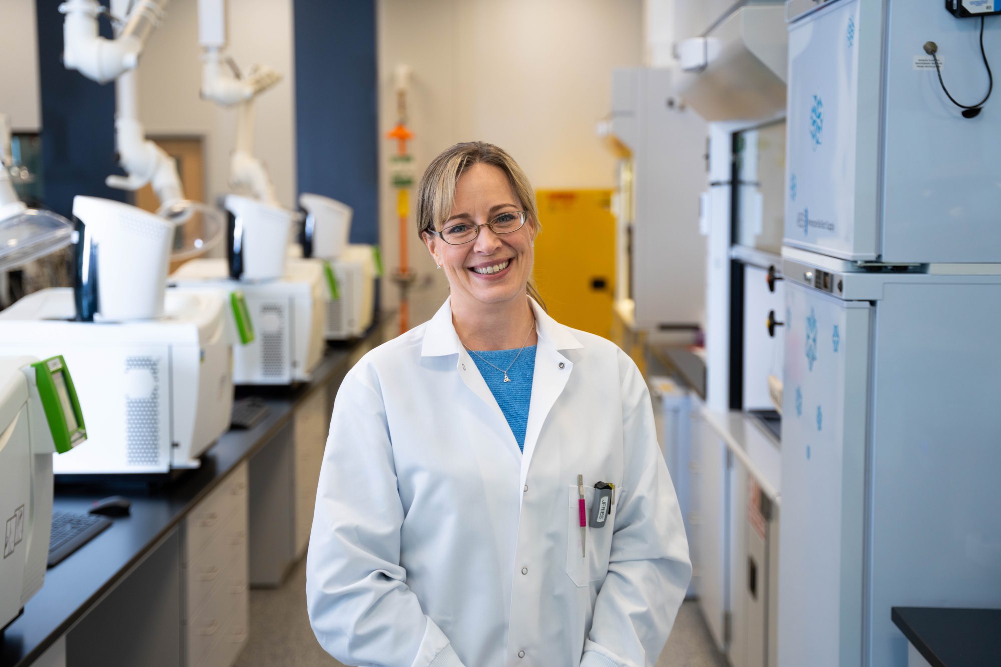 Employee reviewing documents in modern office