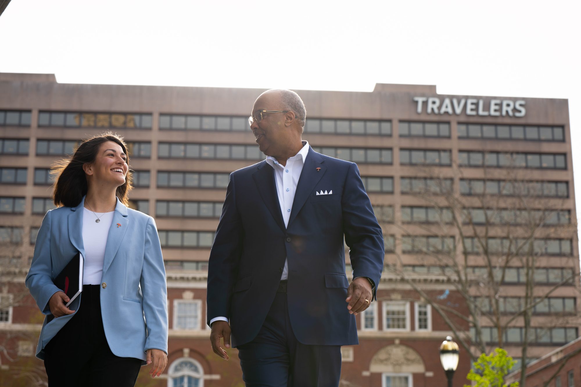 Candid workplace moment between coworkers