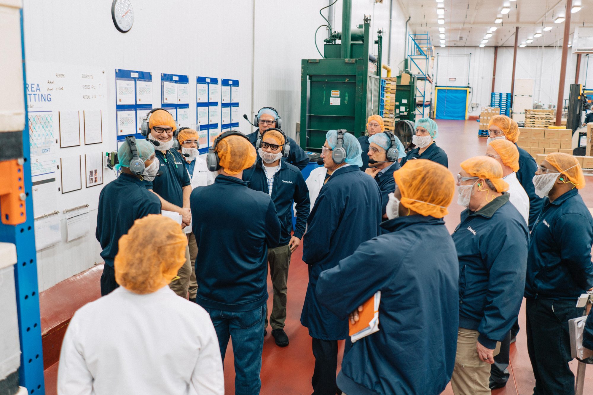 Corporate team meeting in open floor plan office